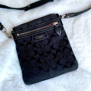 Coach women’s black crossbody messenger bag